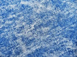 Acid wash denim with retro appeal supplied by RYZEAL SOURCING for edgy looks across men, women, and kids