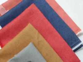 Vibrant colored denim fabrics manufactured by RYZEAL SOURCING for men’s, women’s, and kids’ fashion