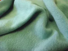 Green fleece knit with soft brushed surface texture