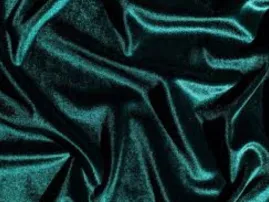 Plush knitted velour fabric with soft reflective pile