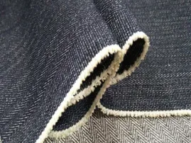 Unwashed raw denim supplied by RYZEAL SOURCING for authentic, long-lasting styles for men, women, and kids