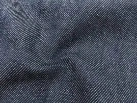 Sanforized denim fabric pre-shrunk by RYZEAL SOURCING to ensure fit stability for men, women, and kids