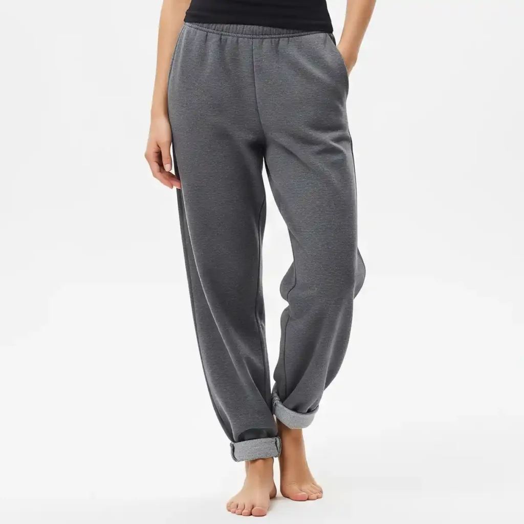 Cuffed women’s sweatpants manufactured by RYZEAL SOURCING in Bangladesh, featuring elastic ankle cuffs for a modern fit.
