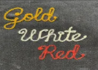 Chain stitch embroidery technique used for textured lettering, available through RYZEAL Sourcing.
