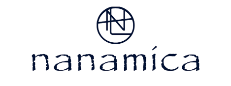 nanamica brand logo with simple black text and circular emblem