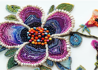 Bead embroidery technique featuring decorative beadwork on fabric.