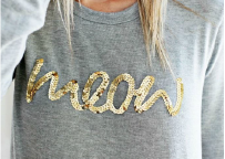 Sequin embroidery for shiny, reflective embellishments on clothing.