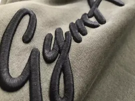 Embroidery stitching technique used for premium garment logos and artwork.