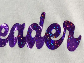 Hologram print technique featuring iridescent, reflective effects on apparel, available through RYZEAL Sourcing.