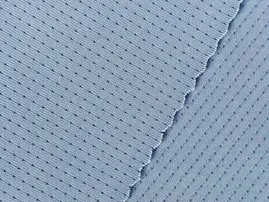 Pointelle knit fabric pattern used by RYZEAL clothing manufacturer for custom garment orders.