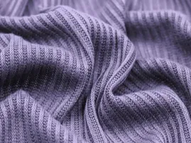 Rib knit fabric texture used by RYZEAL clothing manufacturer for stretchable apparel.