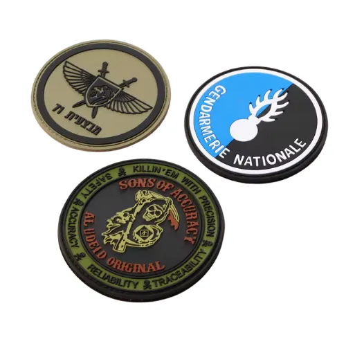 Rubber patch branding component for custom apparel identification.