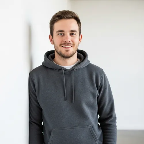 Men’s pullover hoodie in dark grey, part of the premium collection made by RYZEAL, a leading Men’s Hoodie Manufacturer in Bangladesh.