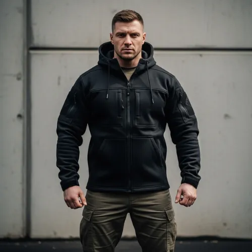 Men’s tactical hoodie with reinforced design and durable fabric, produced by RYZEAL, a Men’s Hoodie Manufacturer in Bangladesh.